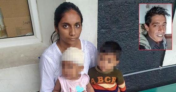 La jeune femme tenant dans ses bras ses deux fils. Ils ont été sauvés de justesse par la police.